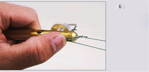 Image of Metal Fishing Hook Knotting Tool